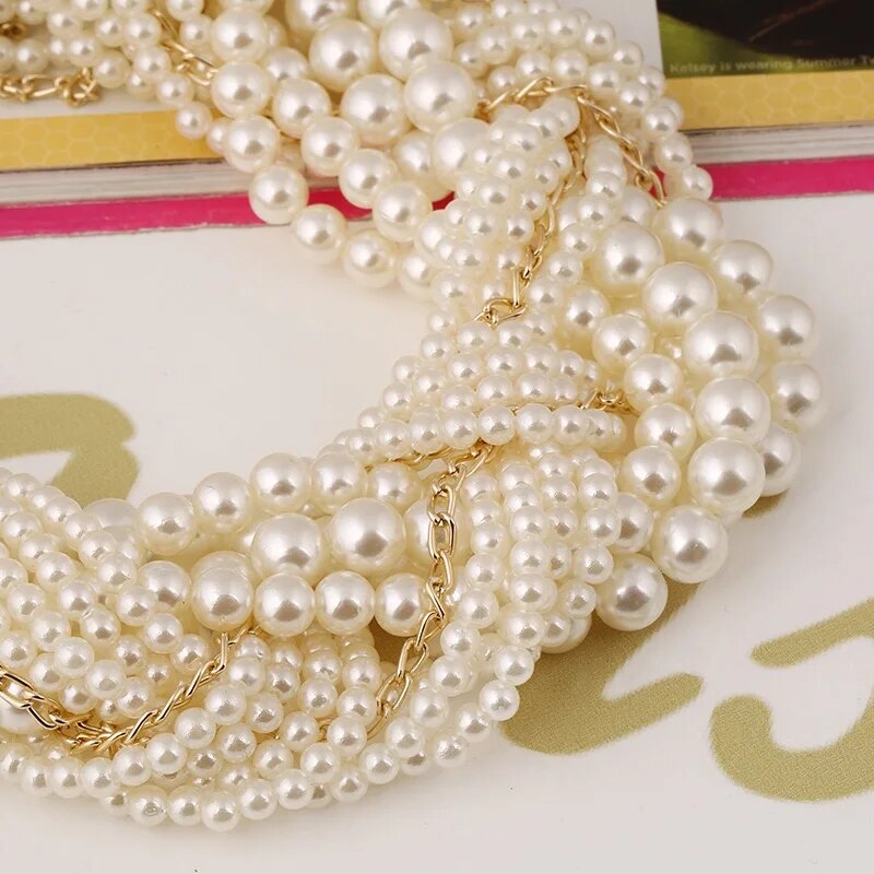 Elegant pearl woven necklace/earrings set